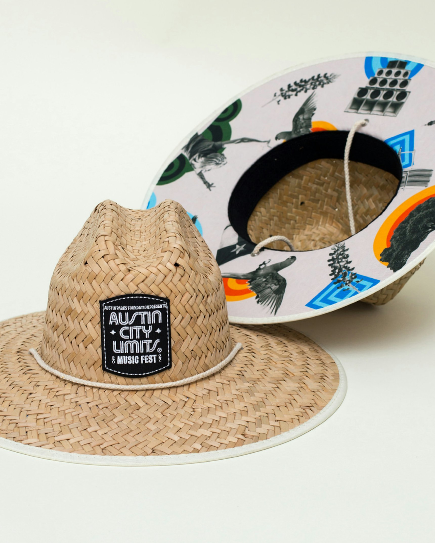 Two straw lifeguard hats with Austin City Limits Music Fest patches and printed underbrim — Live Nation merchandise by MerchCamp