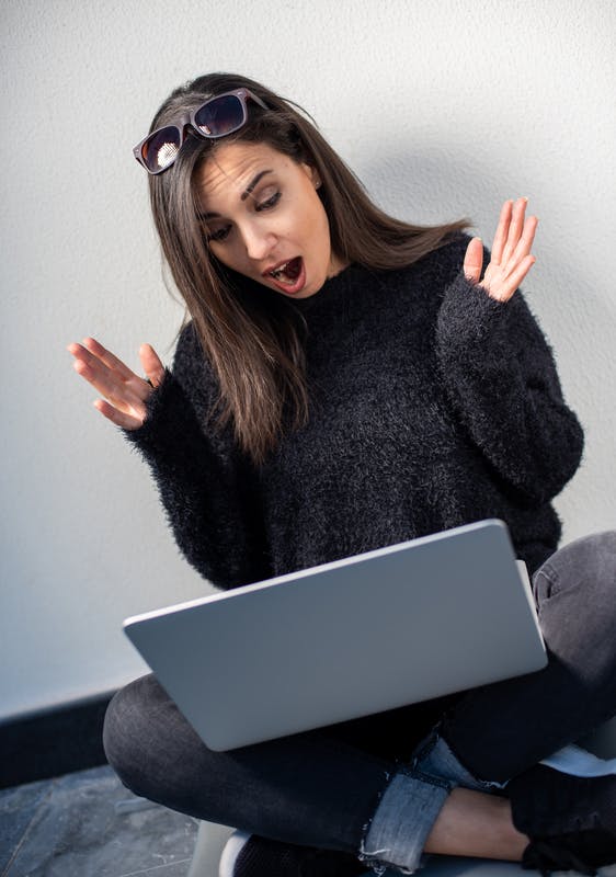 lady surprised on a laptop