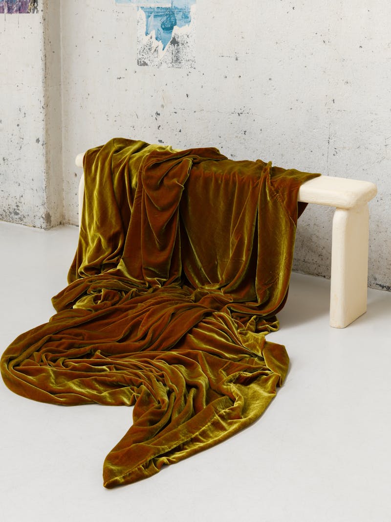 Colour image displaying Velvet Blanket in green by material studio Buro Belén. This item is part of the new 2024 spring collection 'Observations' by online galley Metamorphoses Objects.