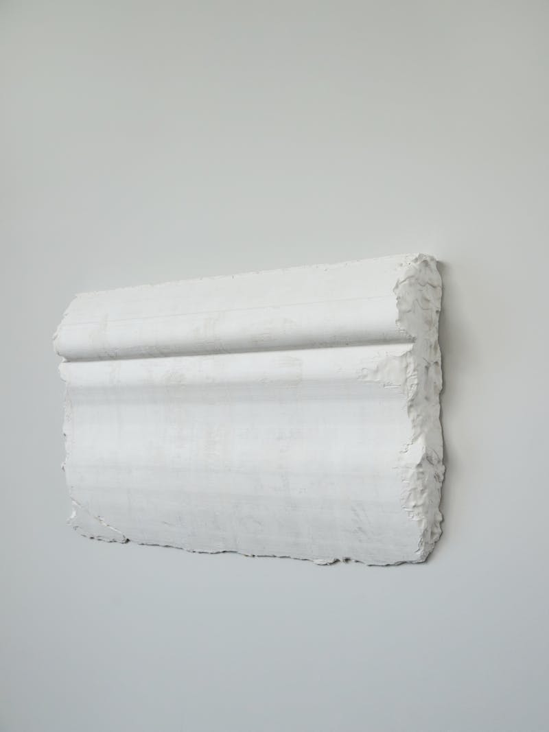 Handmade object - limited edition wall mounted plaster architectural moulding white relief sculpture by Romy Yedida, Israeli artist and designer working in Amsterdam. 