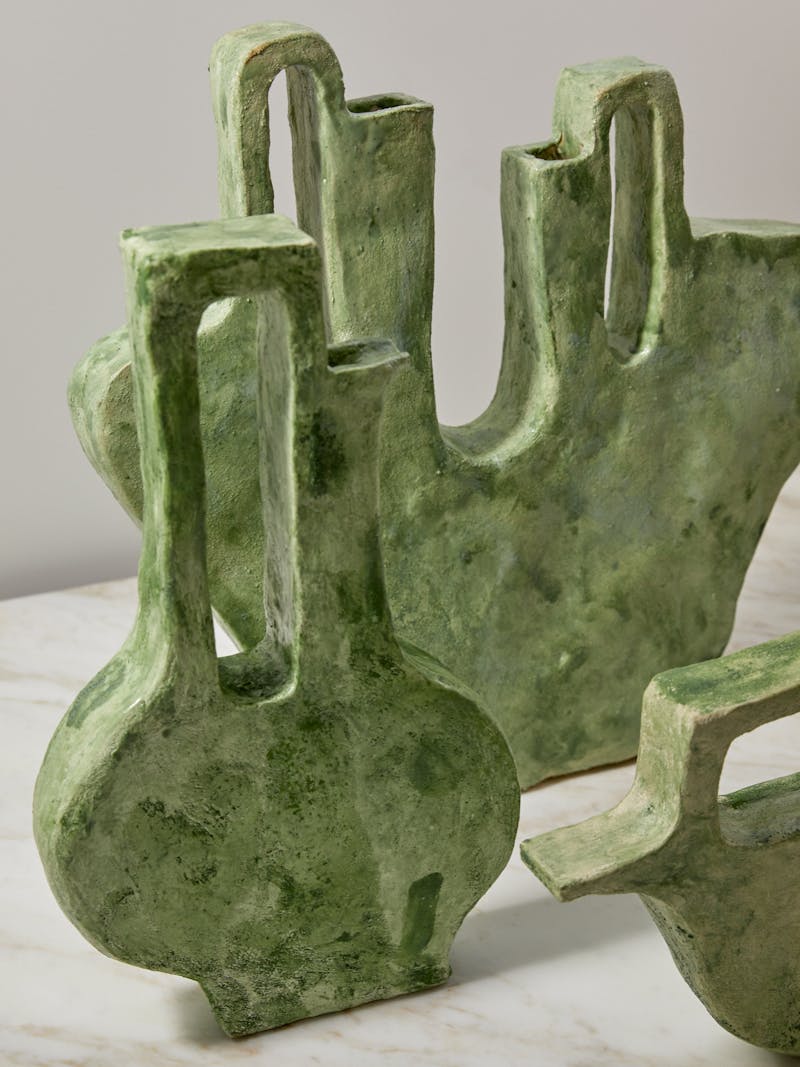 set of three green ceramic flat vessels by artist and craftsman Willem van Hooff with an oblong cut out handle and an irregular glaze surface
