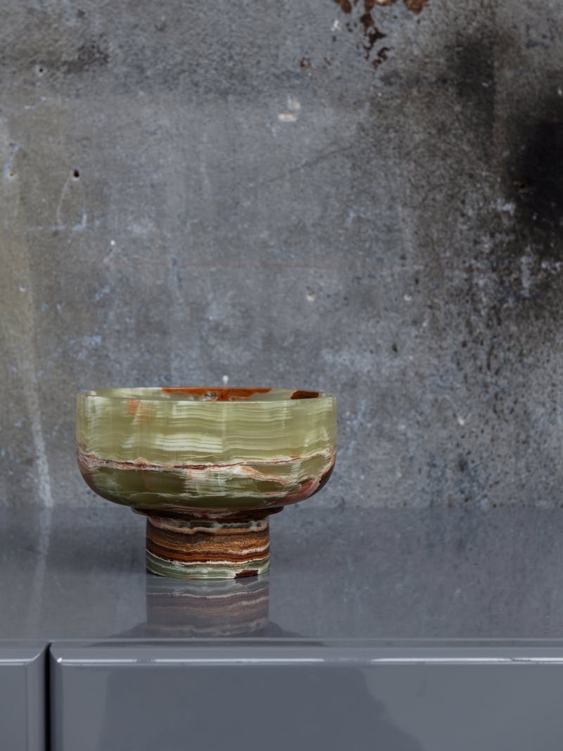 Colour image displaying Lotte Bowl in green onyx by Bloc Studios. This beautiful marble item is part of the new 2024 spring collection 'Observations' by online gallery Metamorphoses Objects.