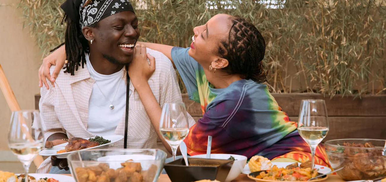 A couple enjoying their meal and having a good intimate time