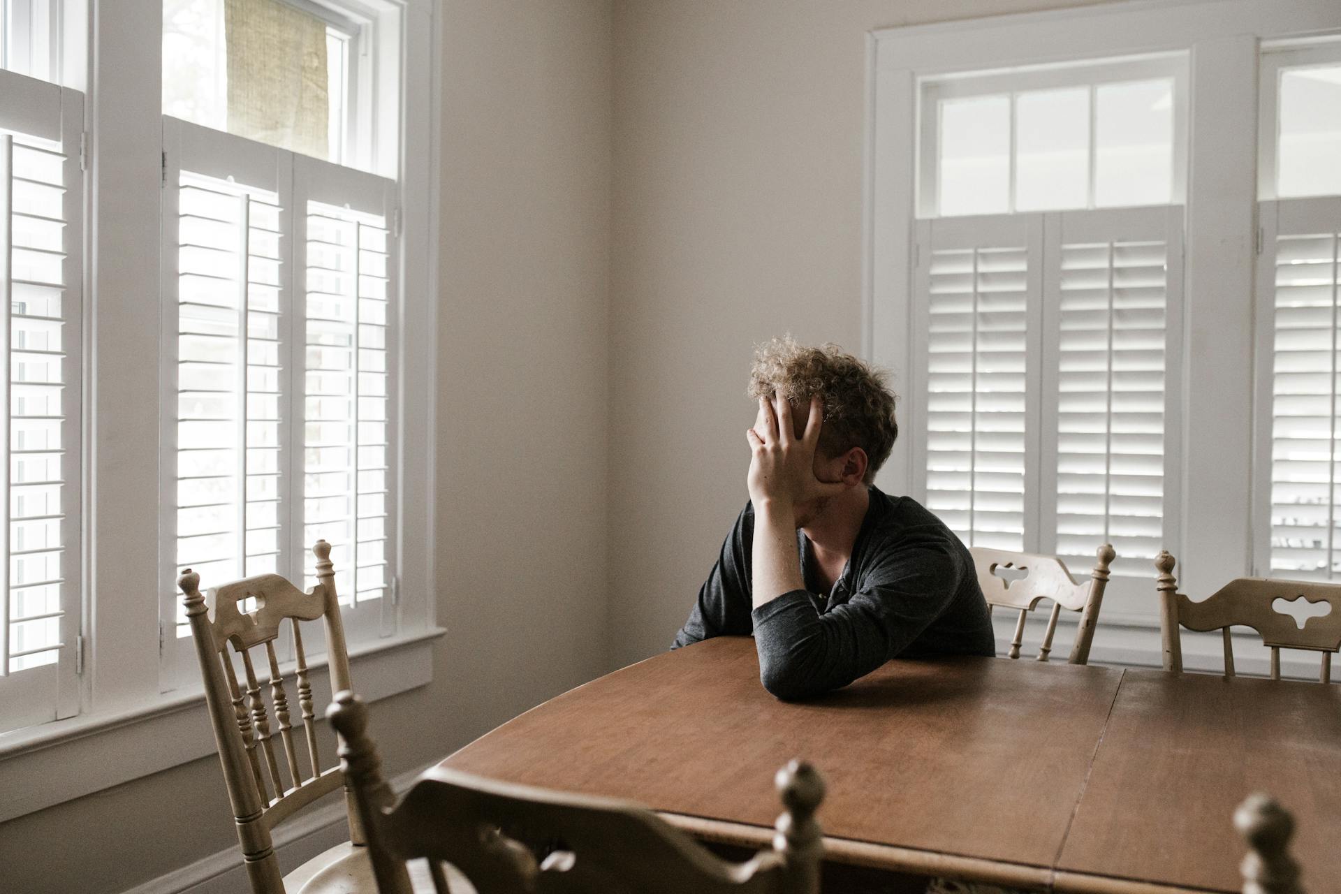 Man feeling hungry after eating a full meal