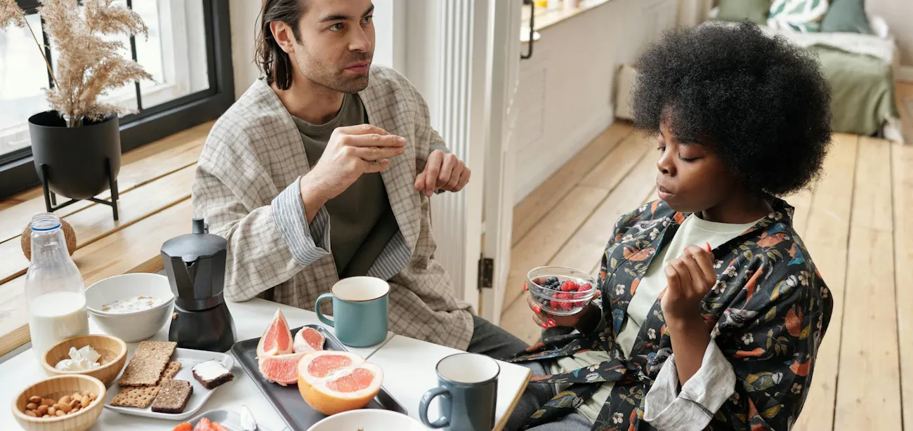 A couple enjoying strawberries to get its anti-aging and longevity secrets of fisetin