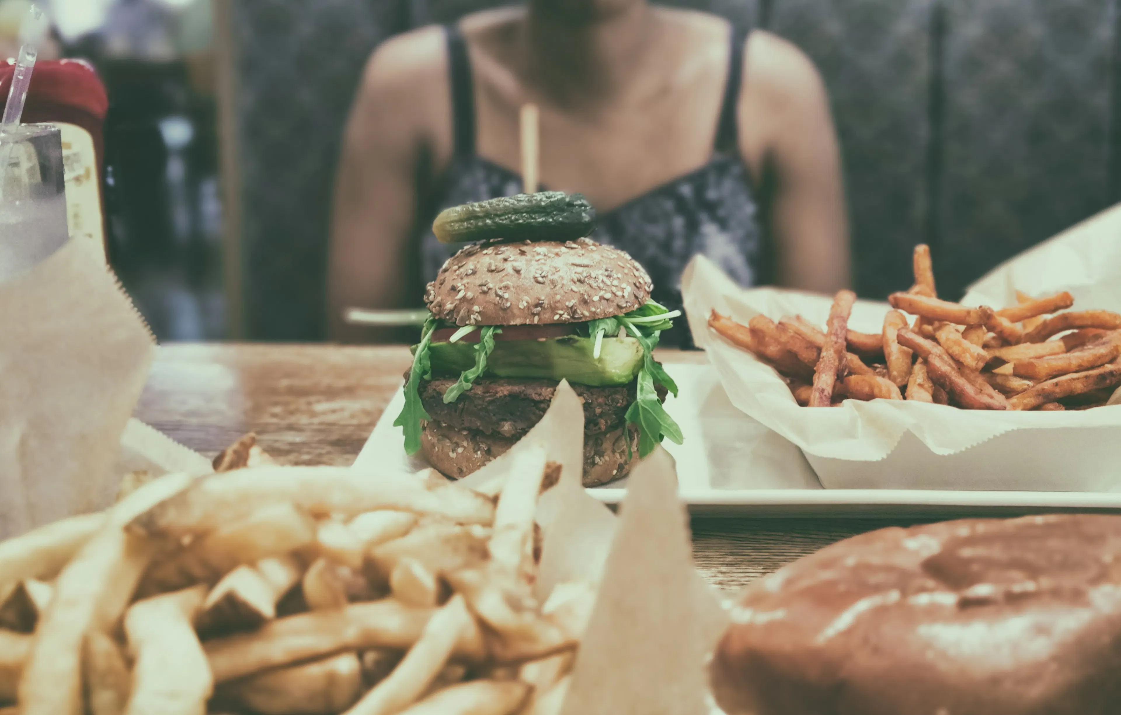 Lady eating highly processed meals