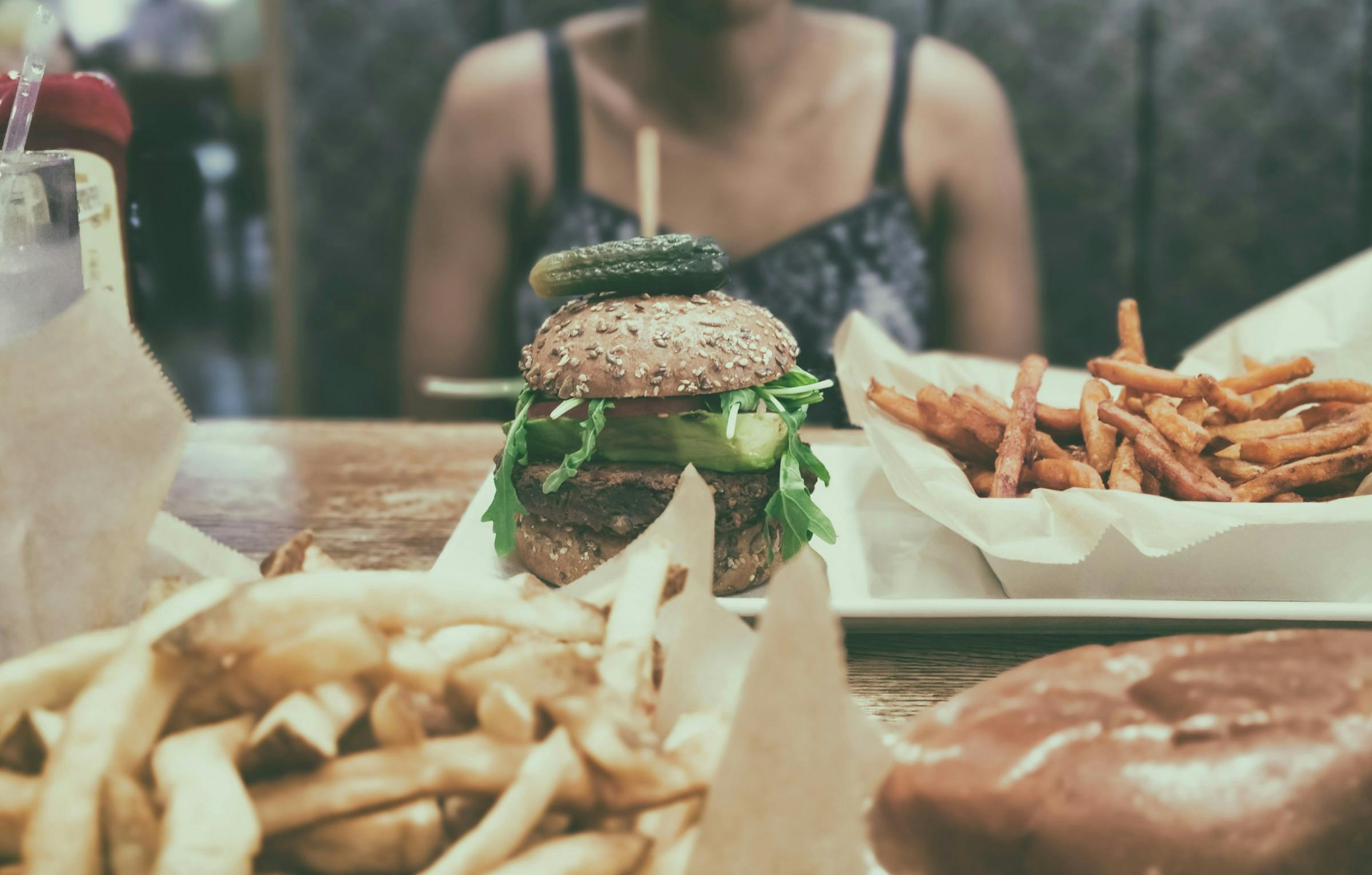 Lady eating highly processed meals