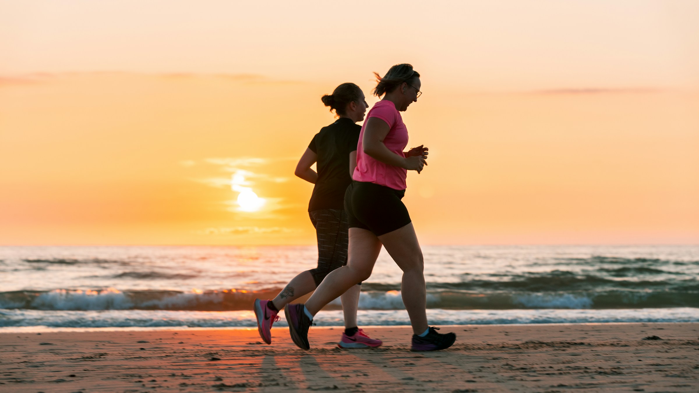 Women walking outdoors for weight management