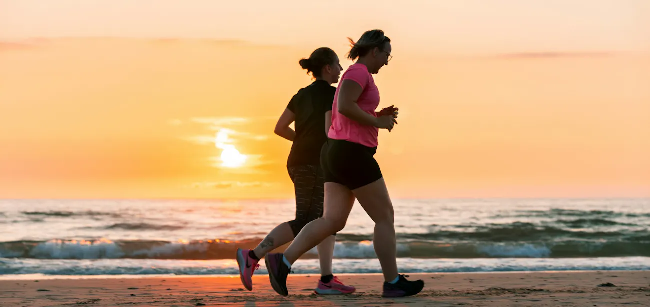 Women walking outdoors for weight management