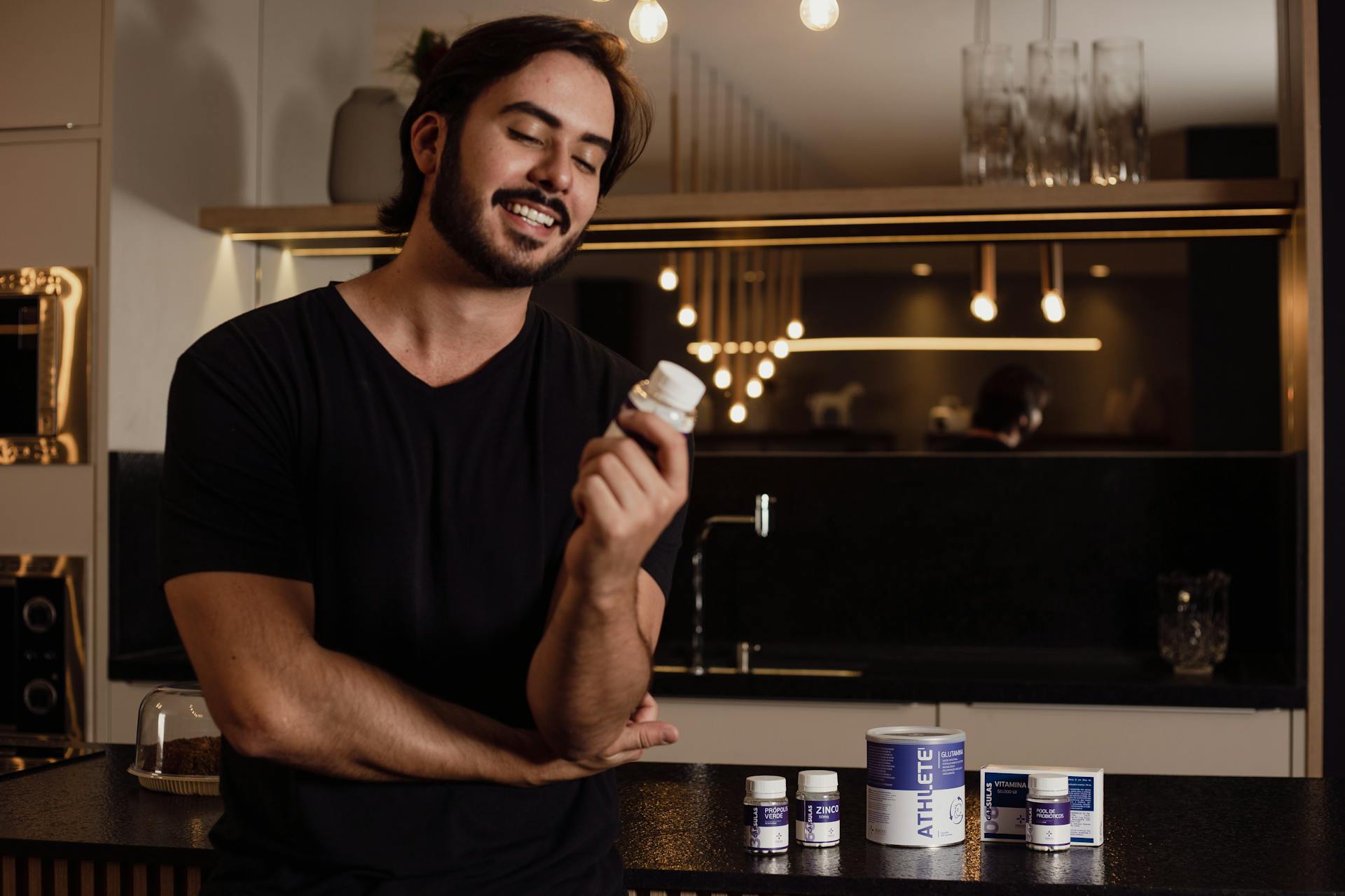 Man taking zinc supplement to boost testosterone level