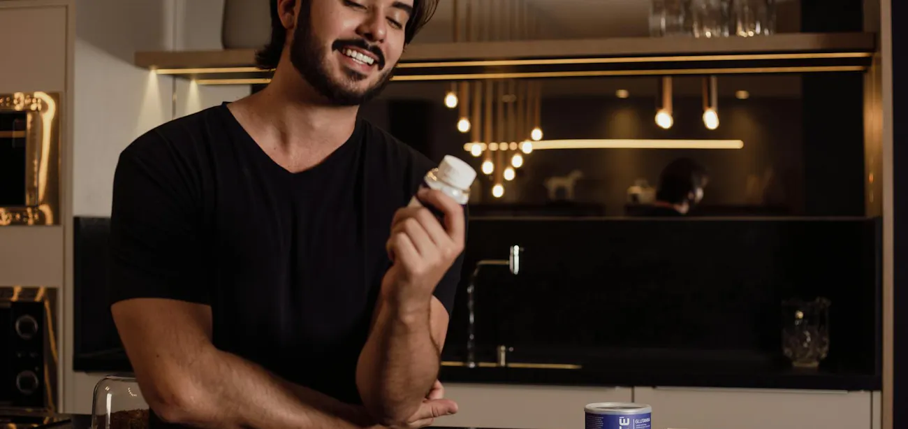 Man taking zinc supplement to boost testosterone level