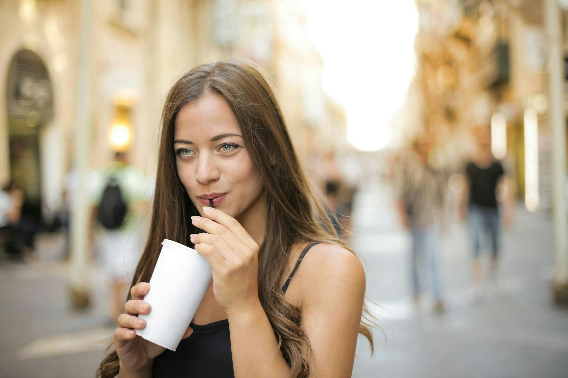 Lady taking a meal shake