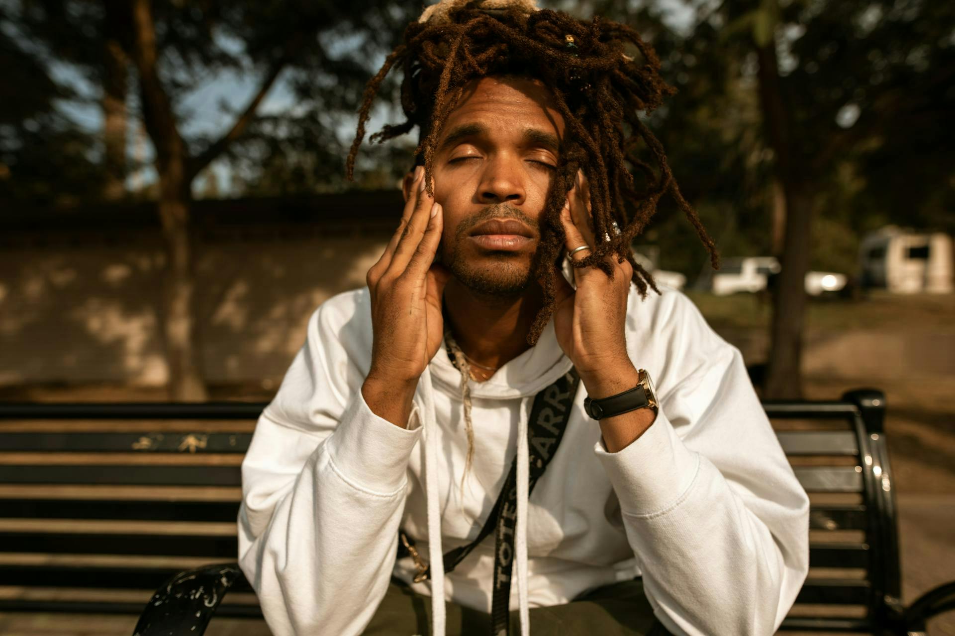 A young man feeling keto headache