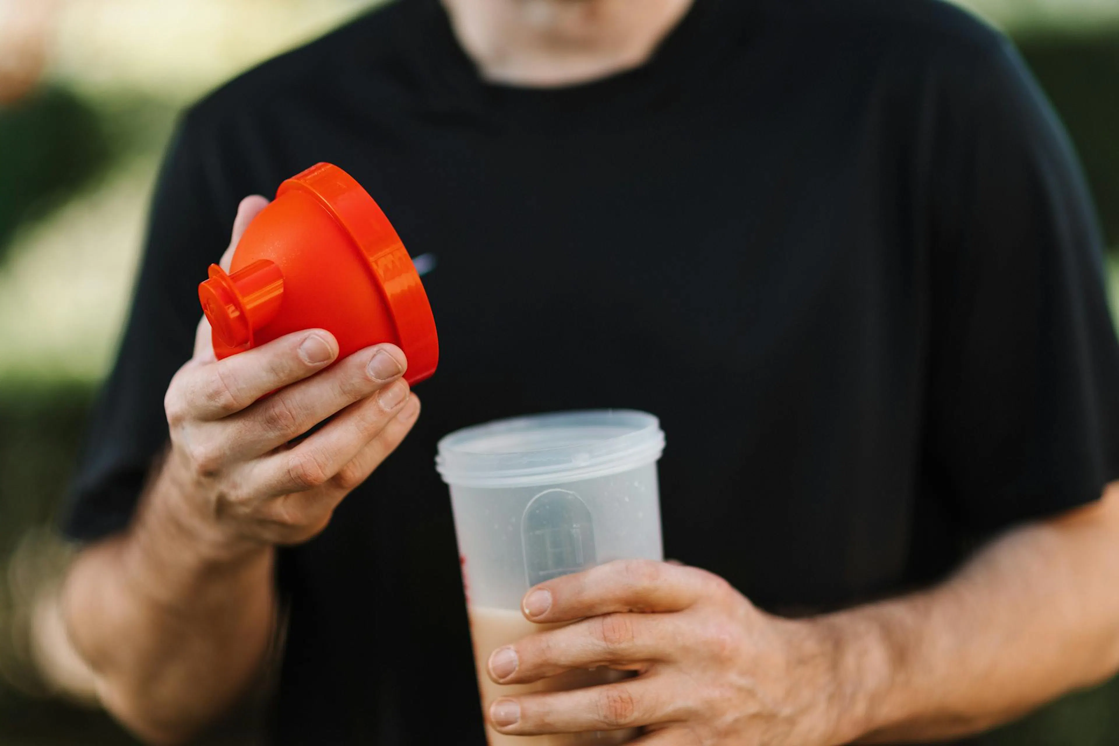 A young man taking berberine supplements
