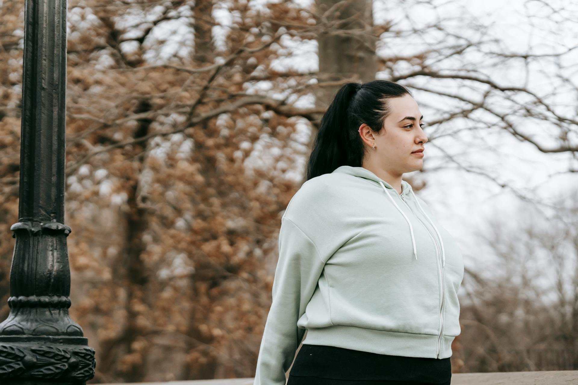 A woman with PCOS doing light stretches