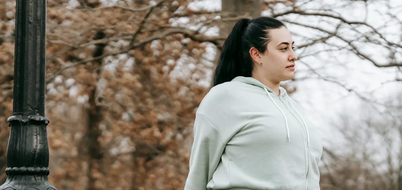 A woman with PCOS doing light stretches