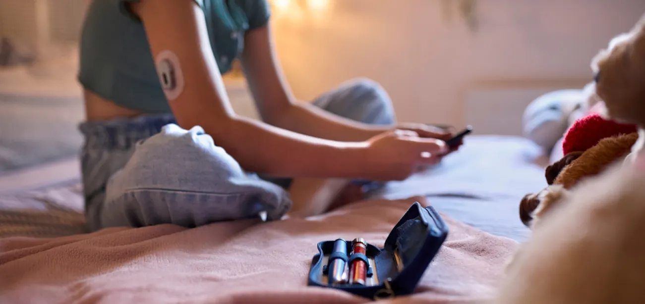 Person checking her blood sugar spike during illness