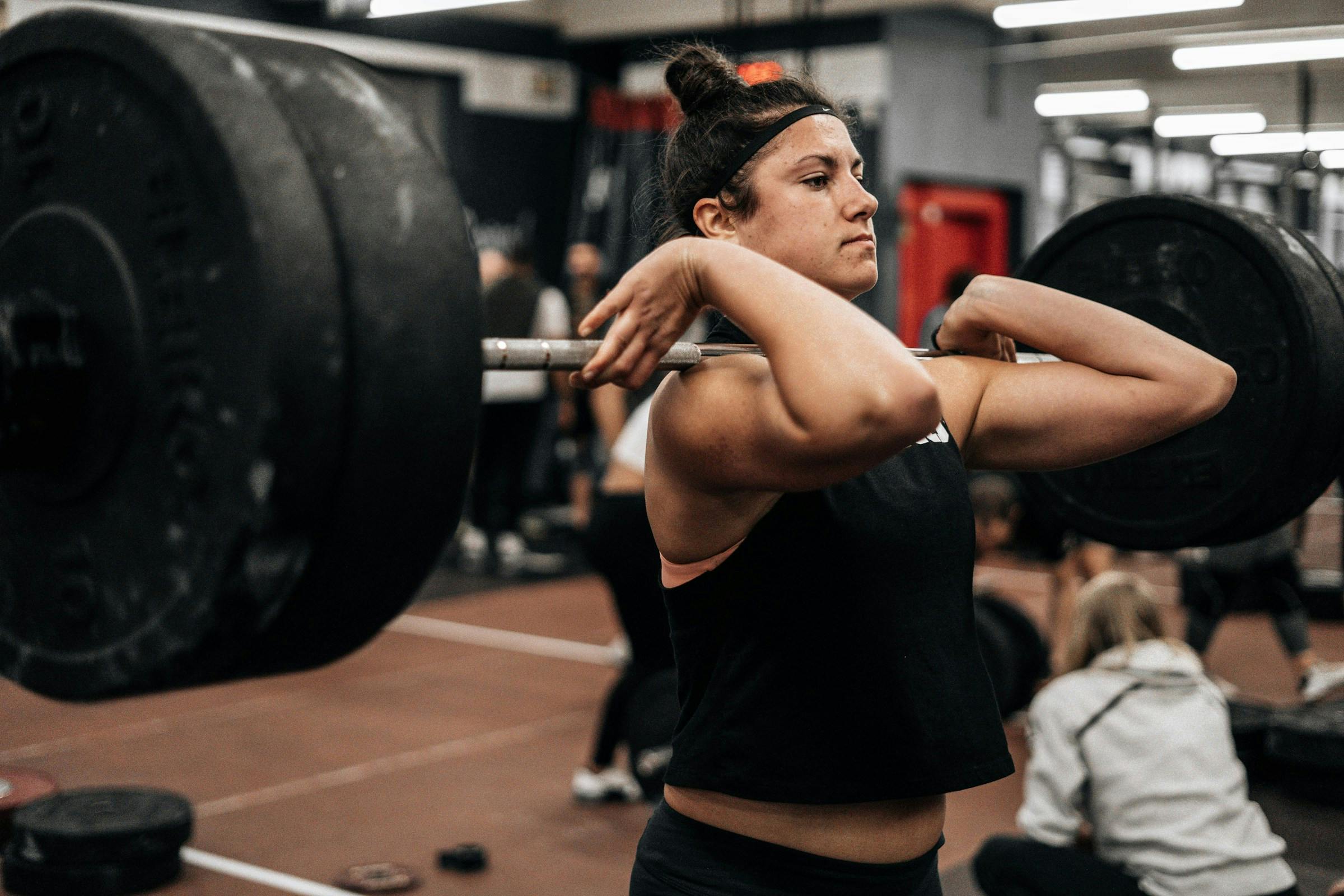 woman doing strength training for calorie burn