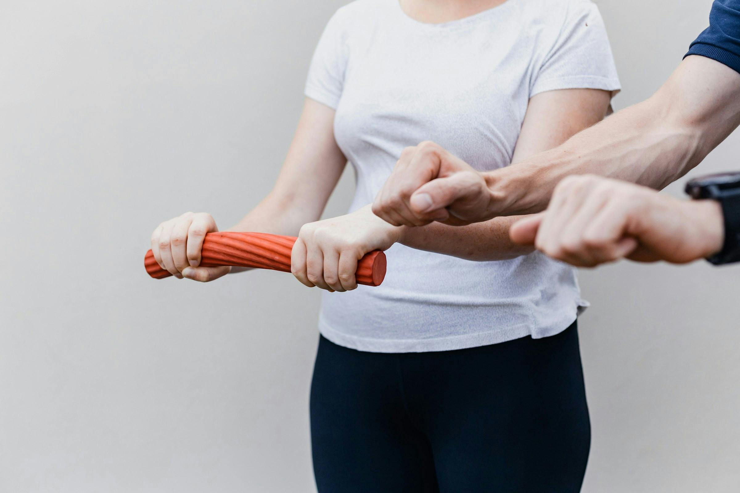 A person testing muscle strength and aging