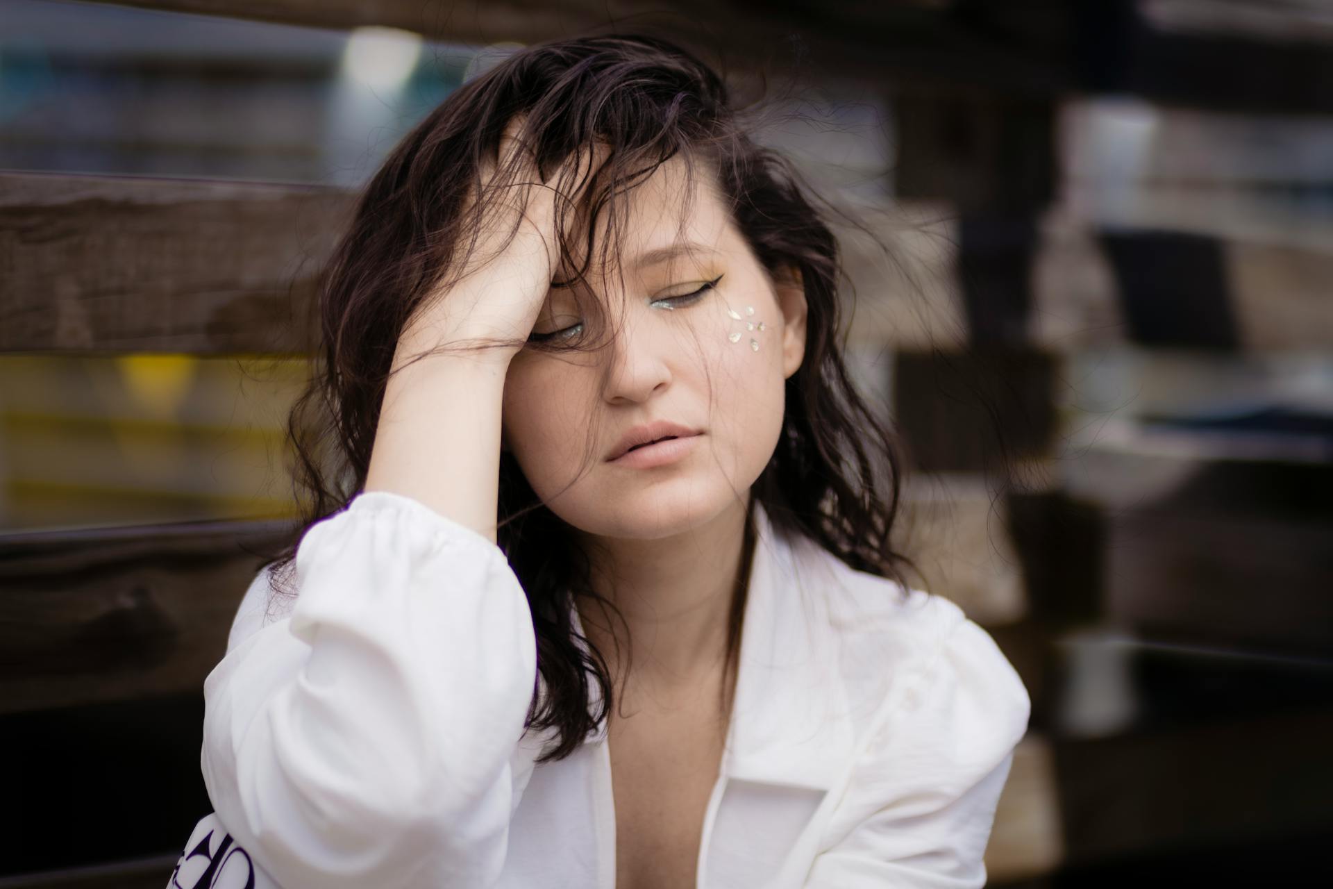 A lady feeling stressed and releasing cortisol hormone