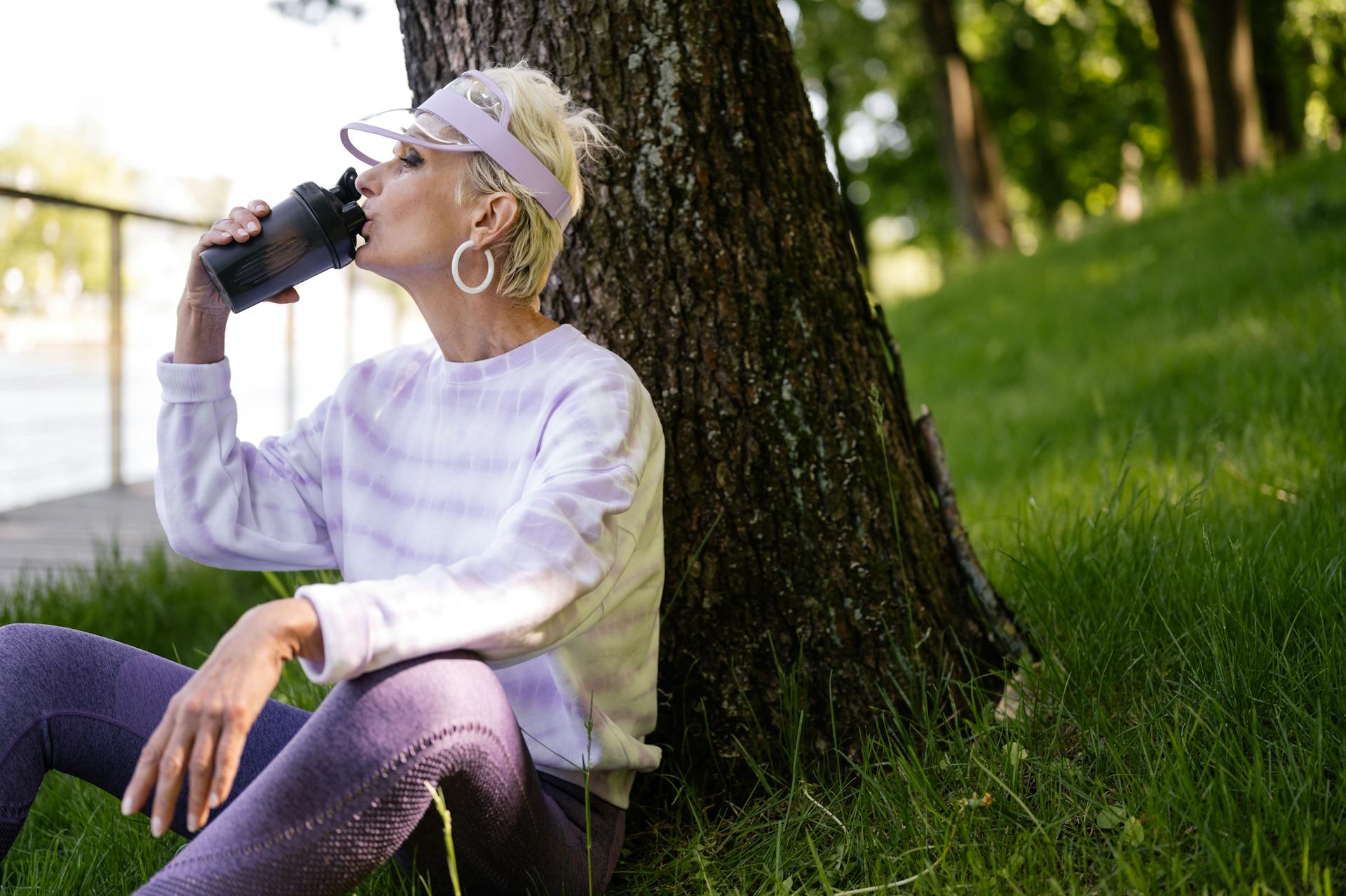 A healthy elderly woman resting after an exercise