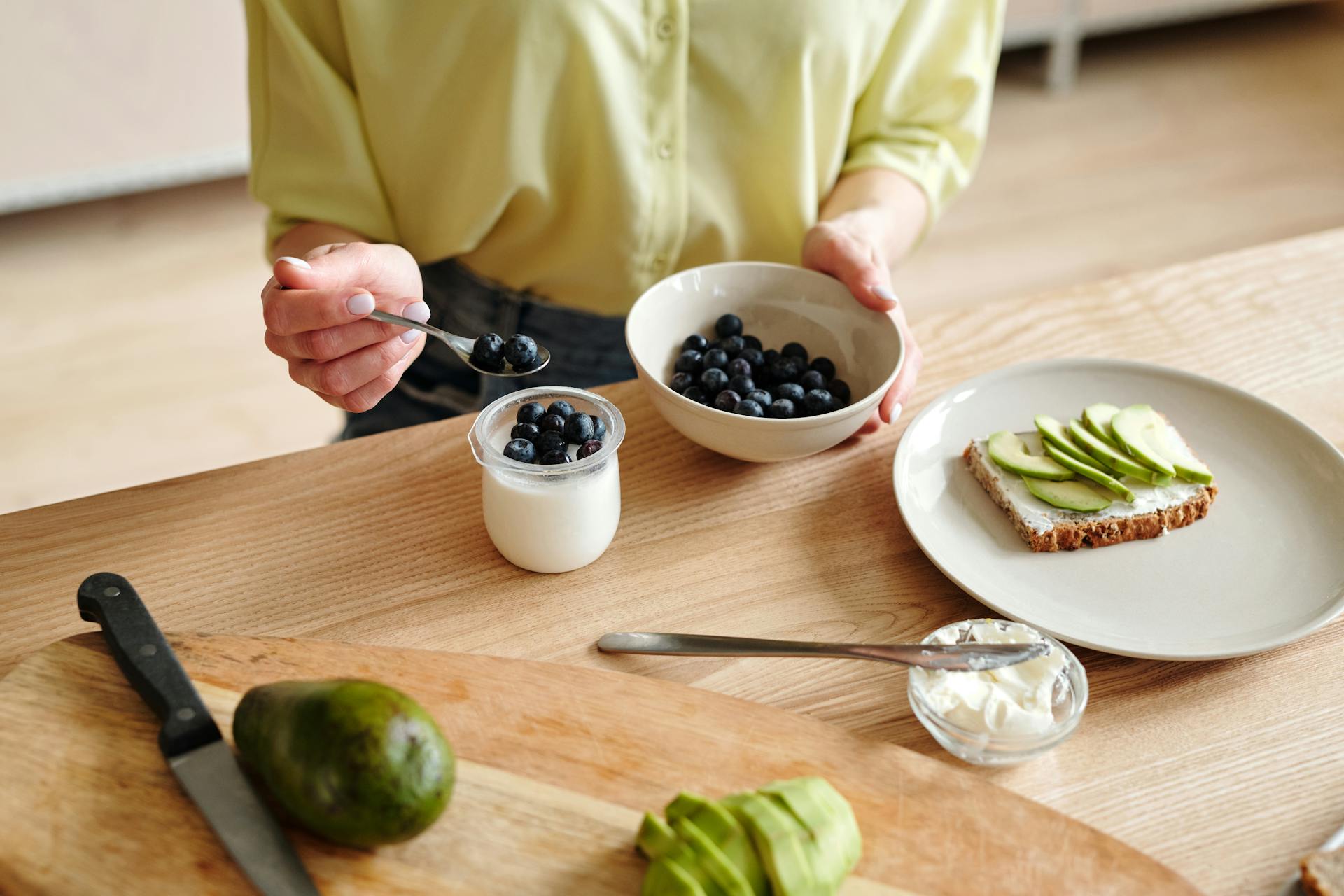 Healthy snack yogurt with berries and avocado