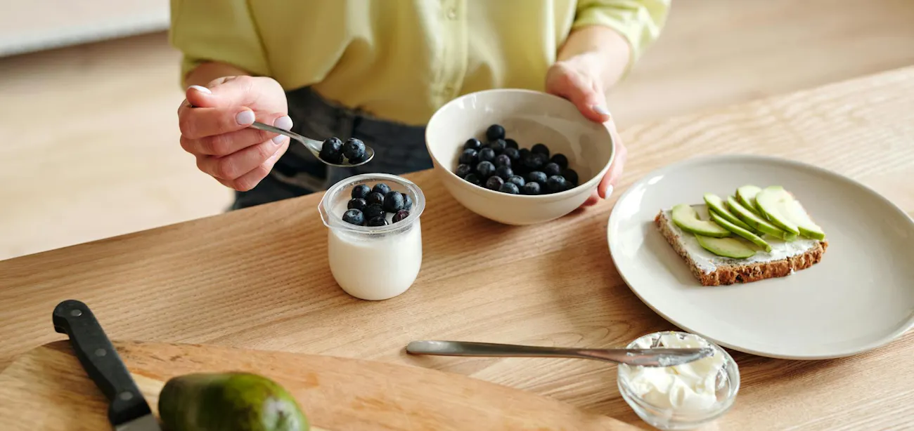 Healthy snack yogurt with berries and avocado