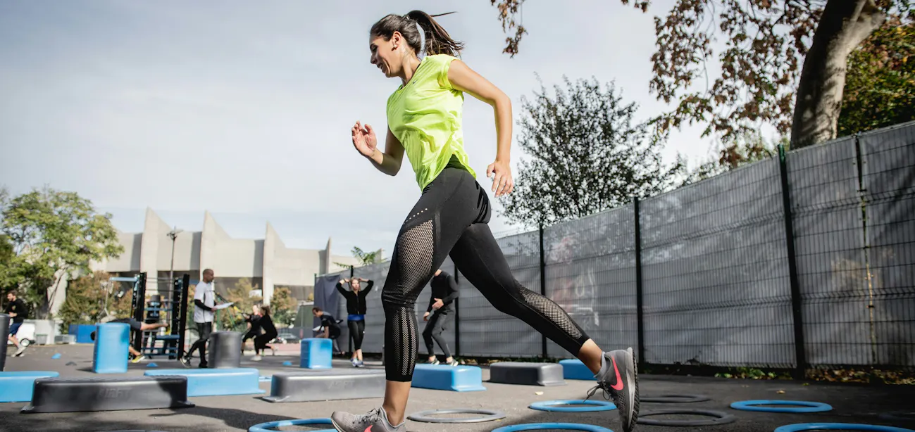 A lady exercising to improve her biological age