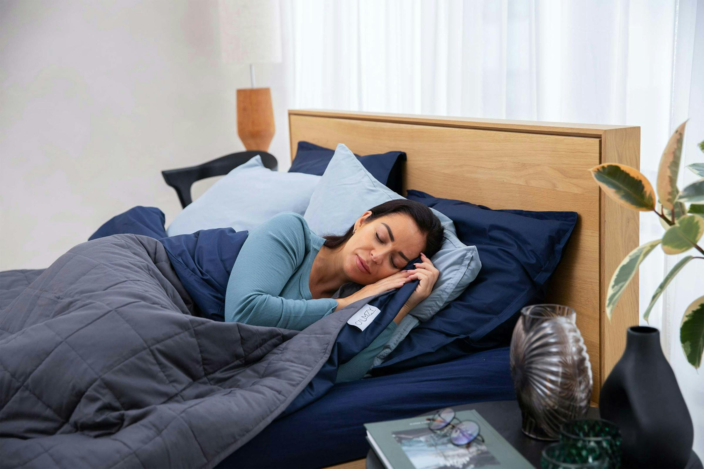 Woman sleeping peacefully to support fat loss