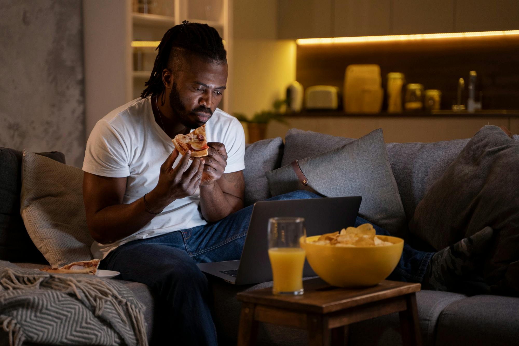 Snacking on junk food at night
