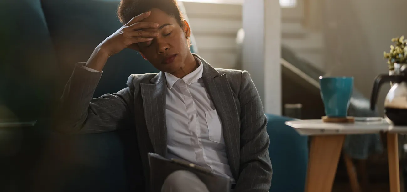 A person feeling tired from perimenopause fatigue