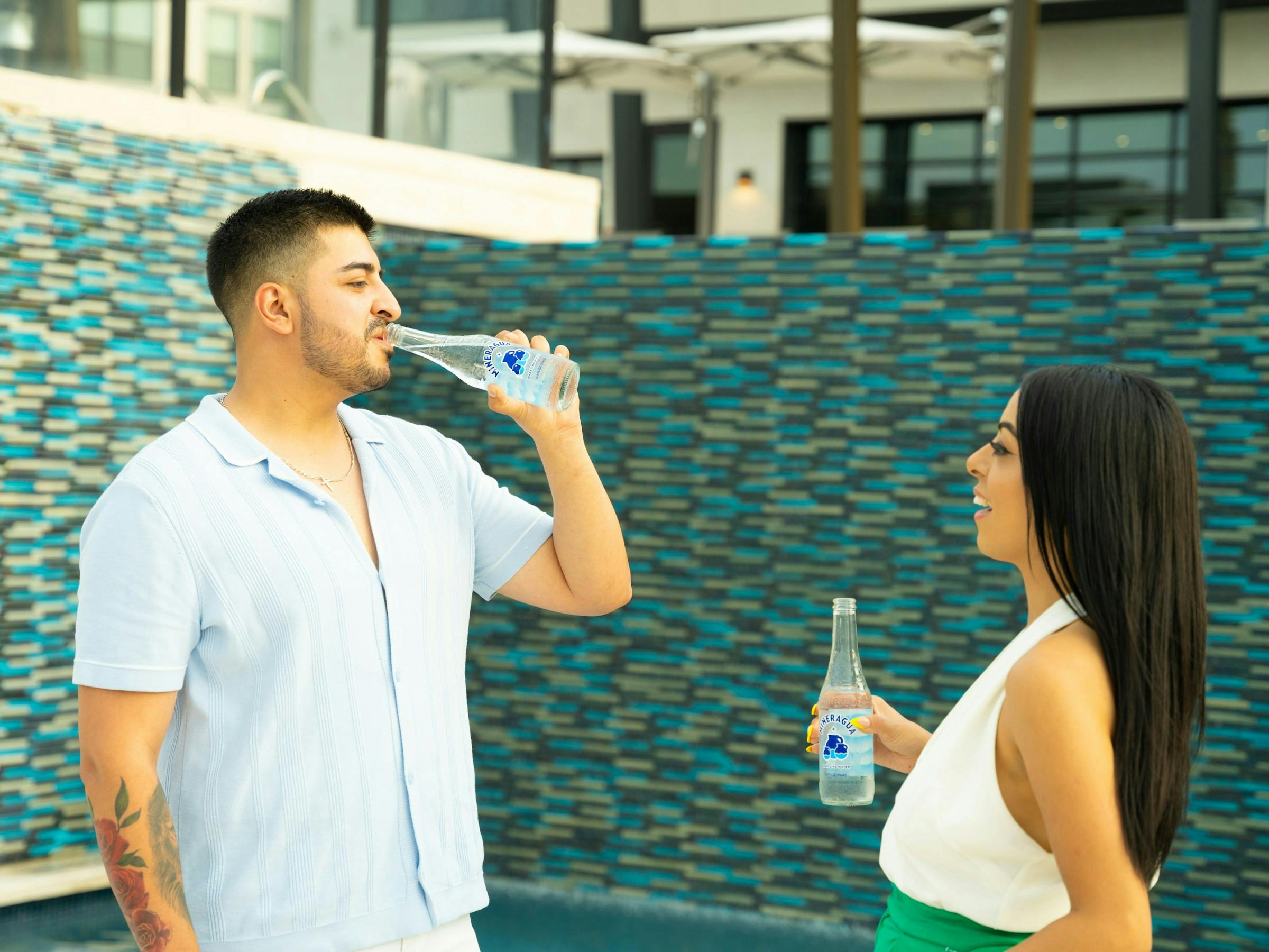 A couple enjoying propel water together