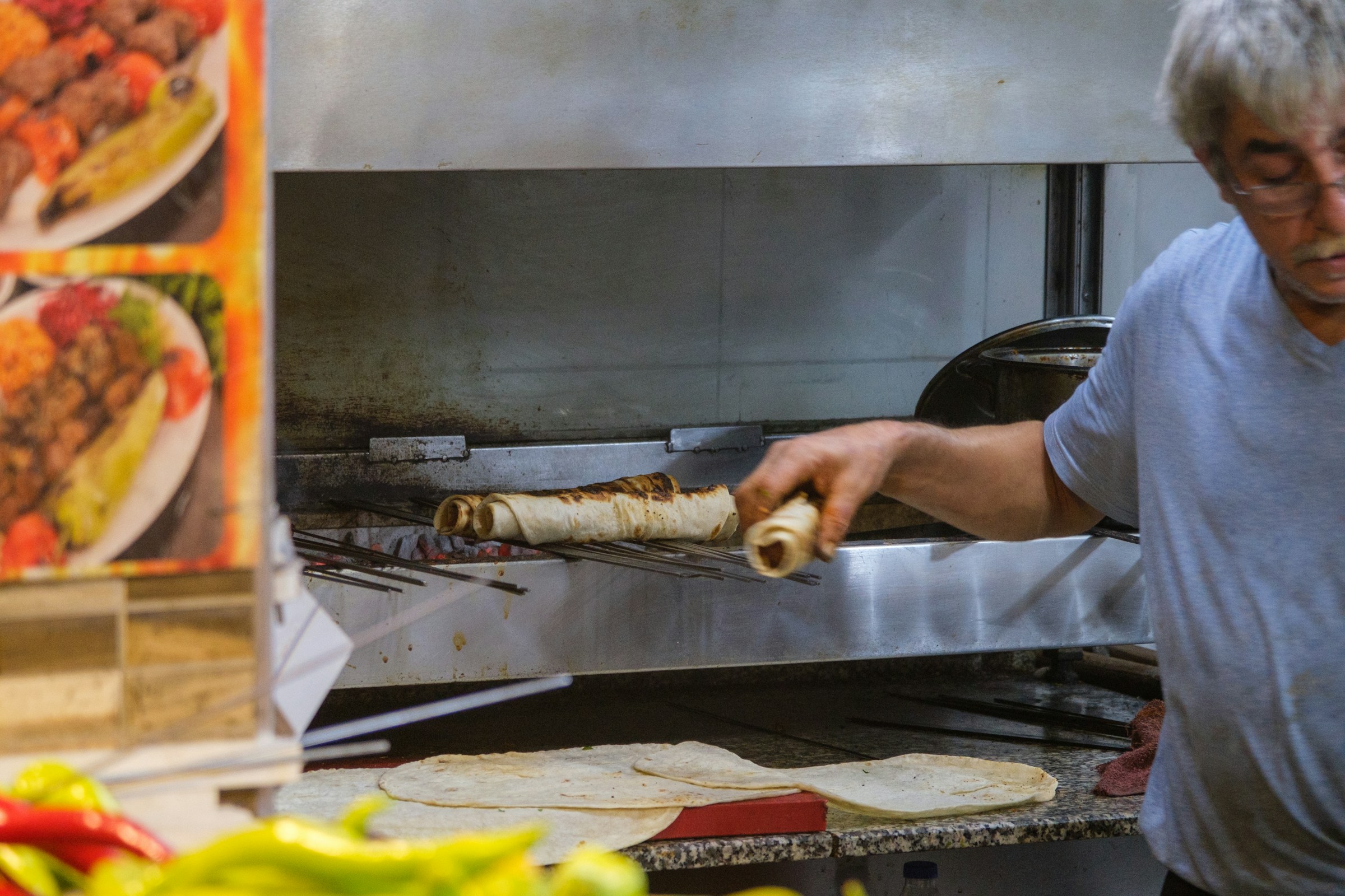 Baker making low glycemic Mediterranean-style pita bread