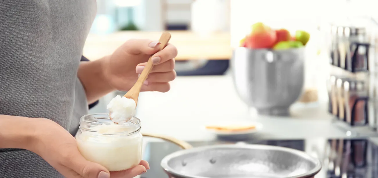 A person Coconut oil as a natural source of MCTs