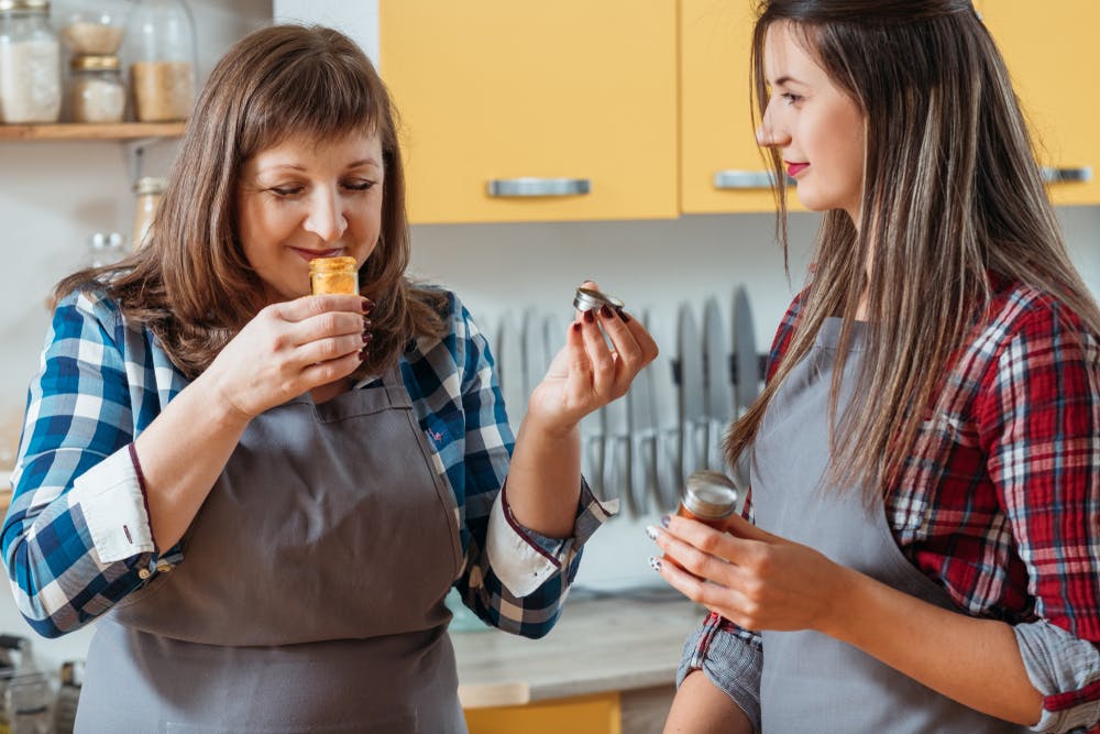 Person replacing coriander with curry powder