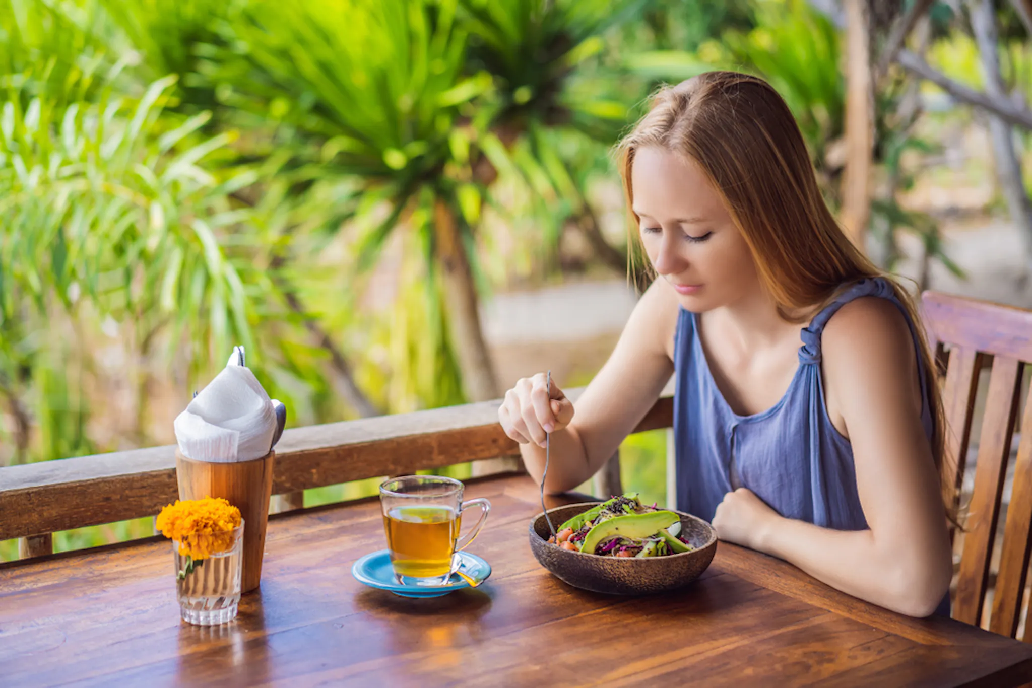 A bowl of cooked quinoa served with vegetables, ideal for weight loss meals
