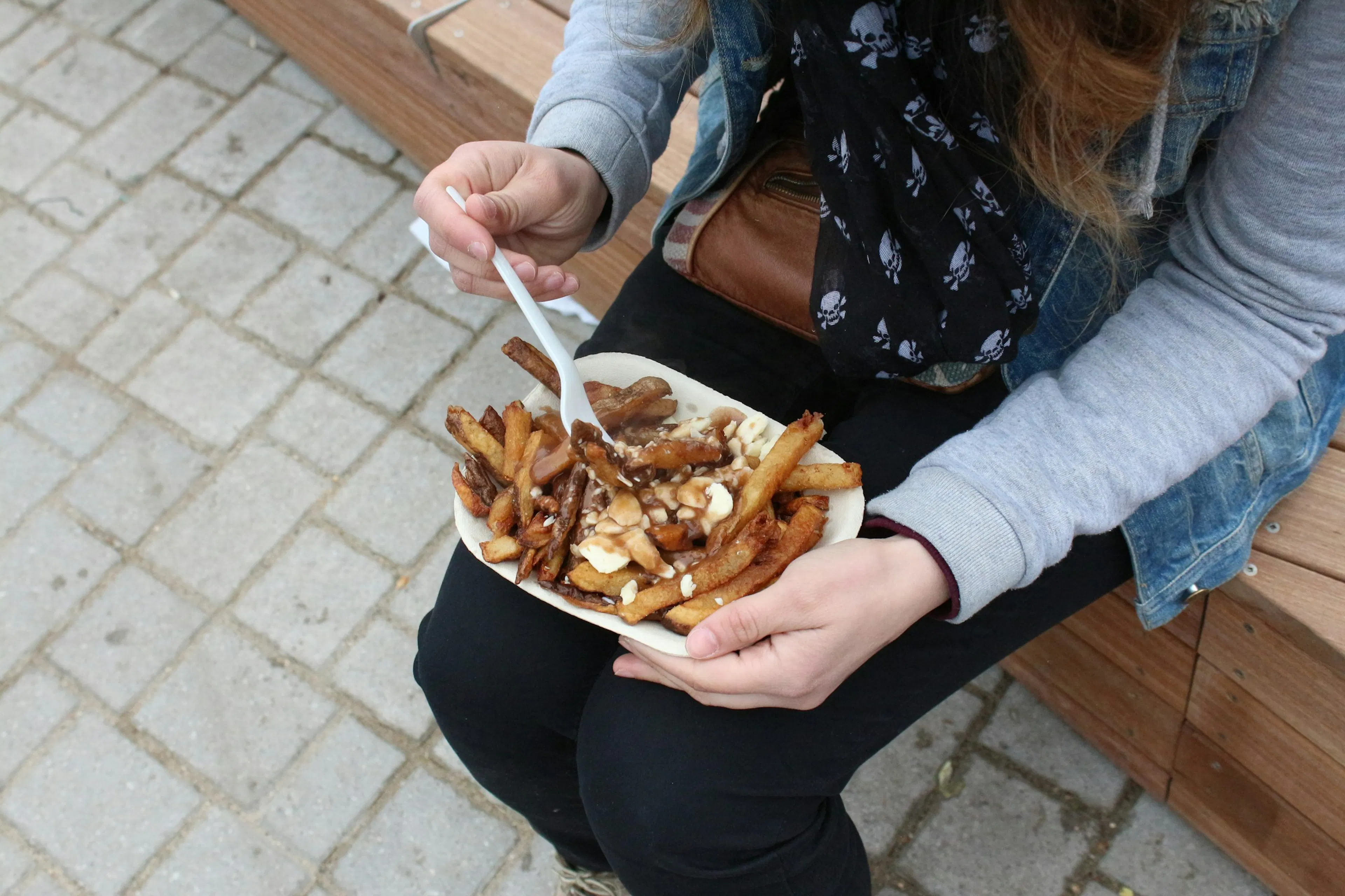 Person eating fries for dinner