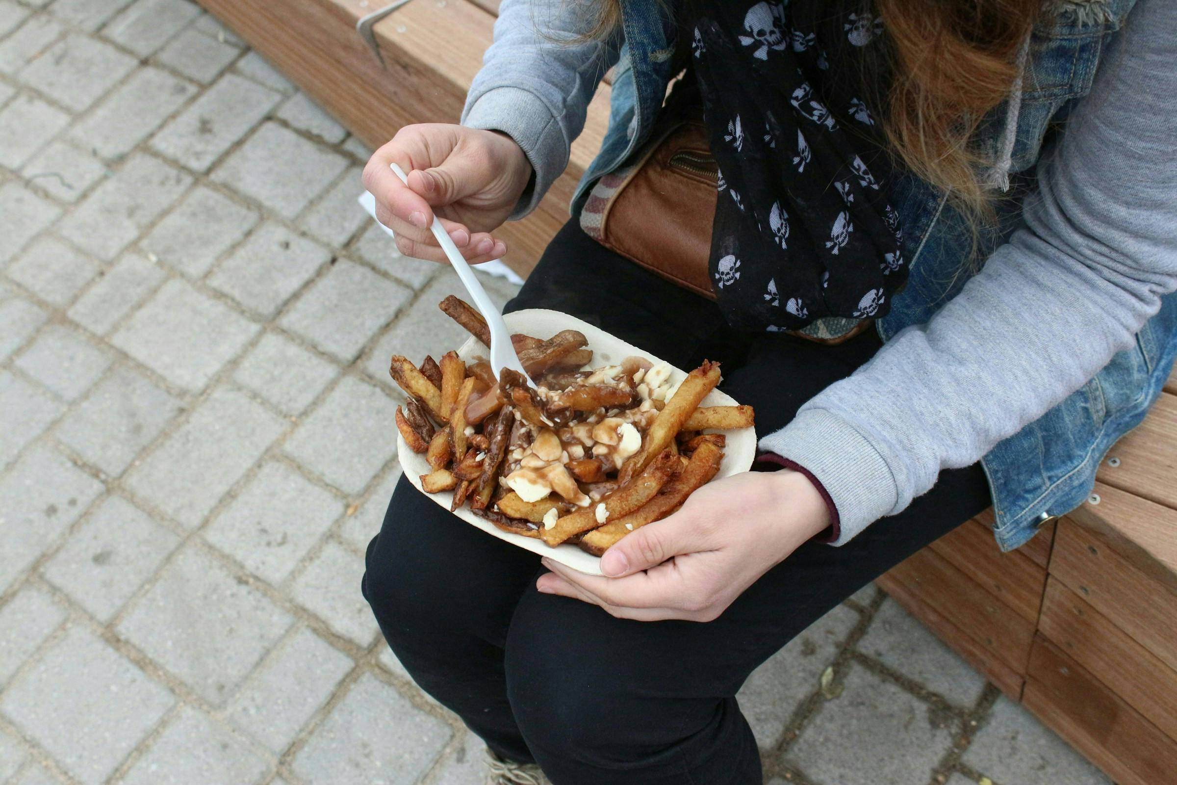 Person eating fries for dinner