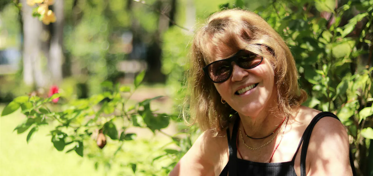A woman in her 50s enjoying summer