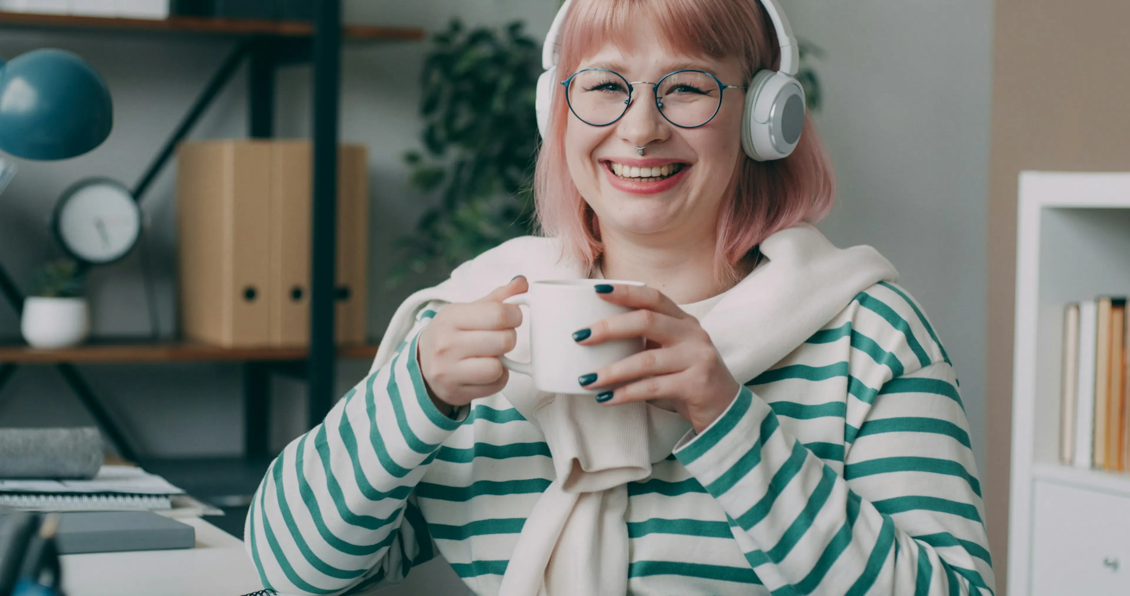A middle-aged lady in her 40s enjoying tea