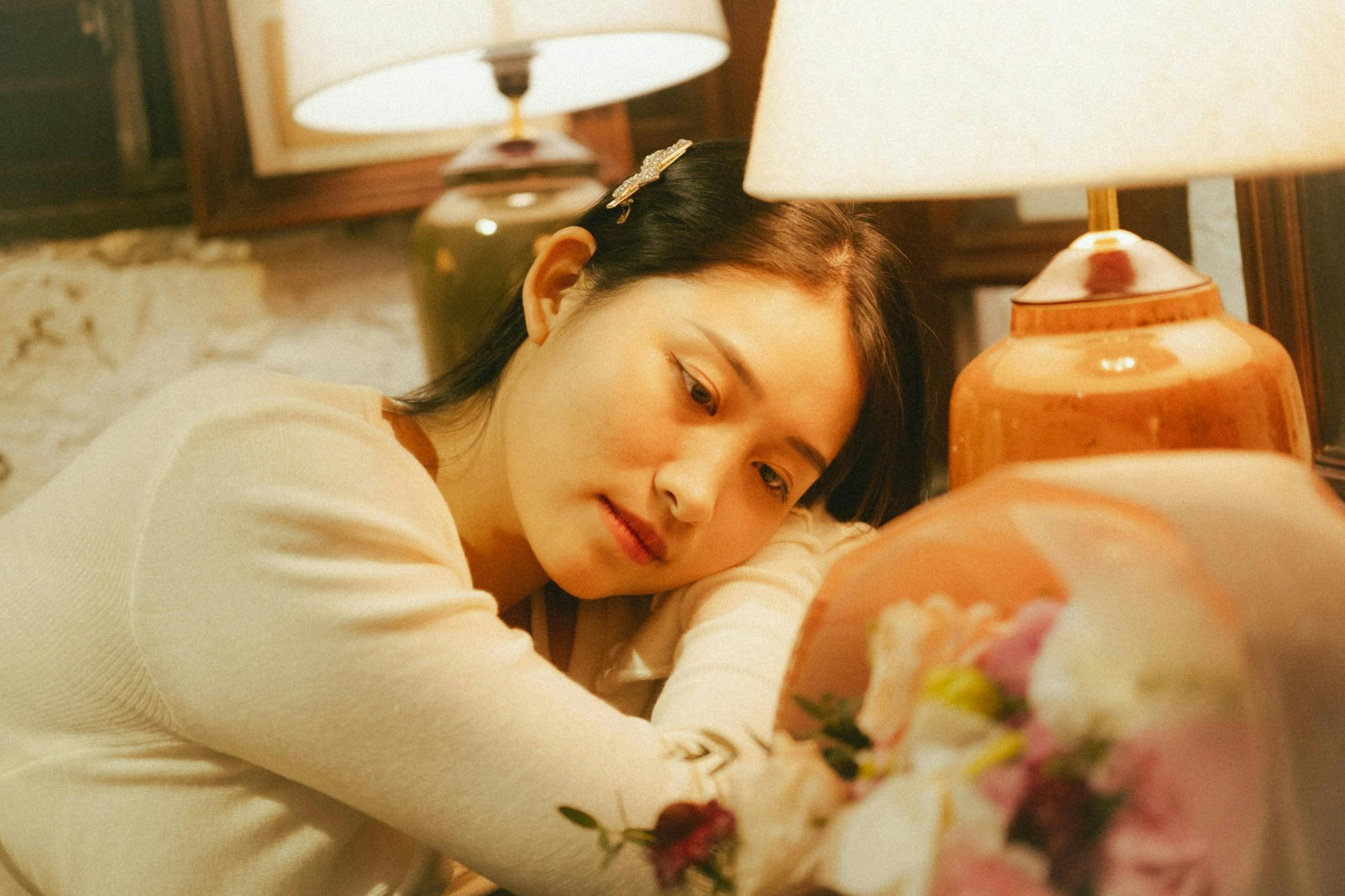 A lady feeling stressed from lack of sleep leading to progressive weight gain