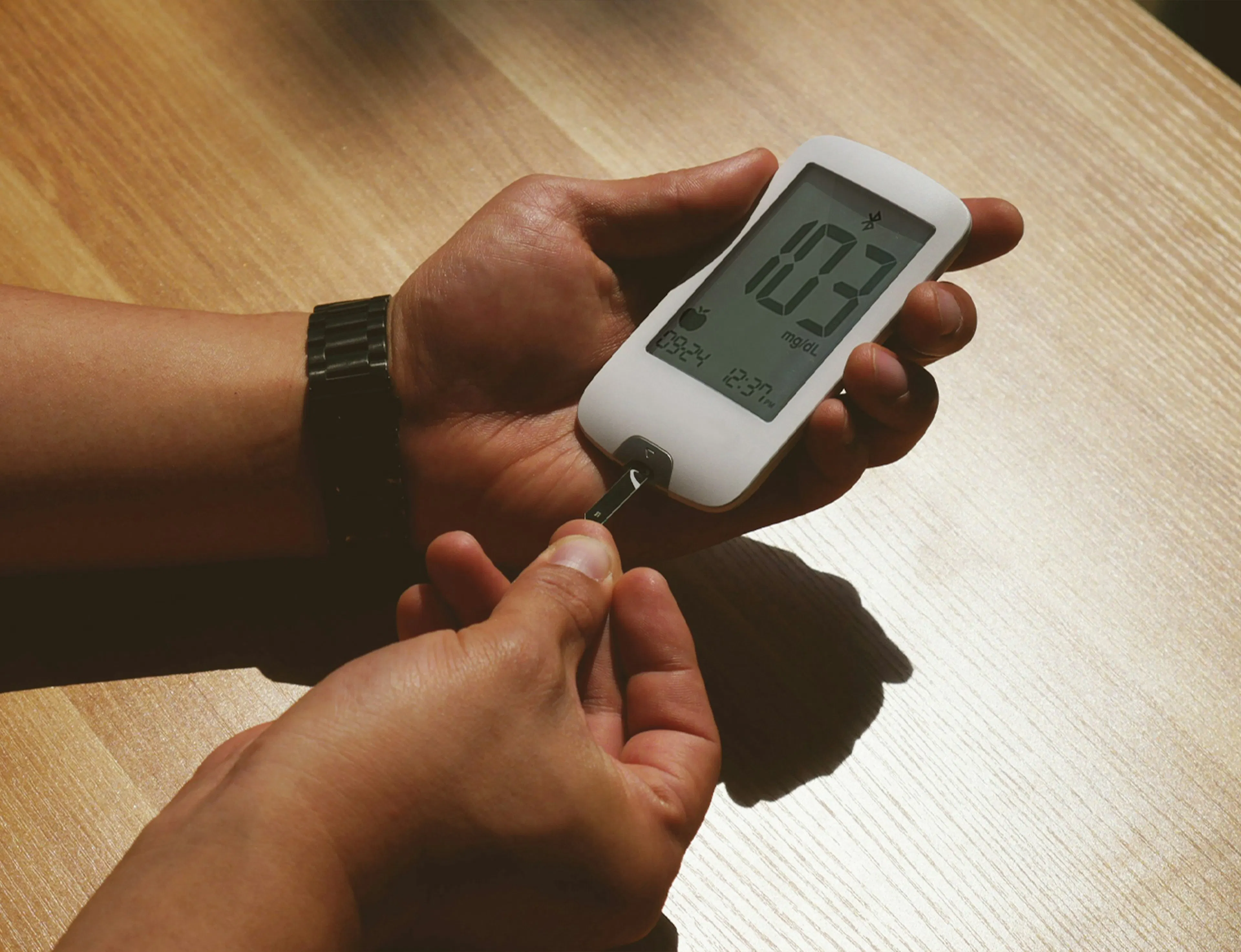 Person checking their blood glucose levels