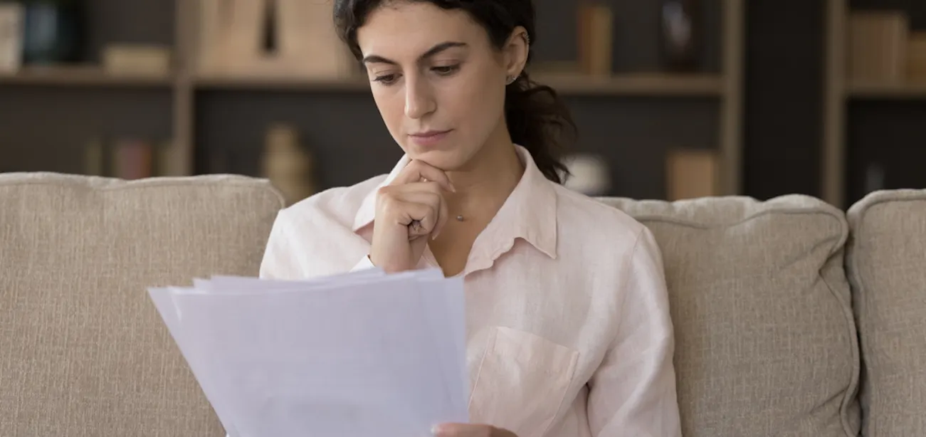 A lady checking her lab results to understand her estradiol levels