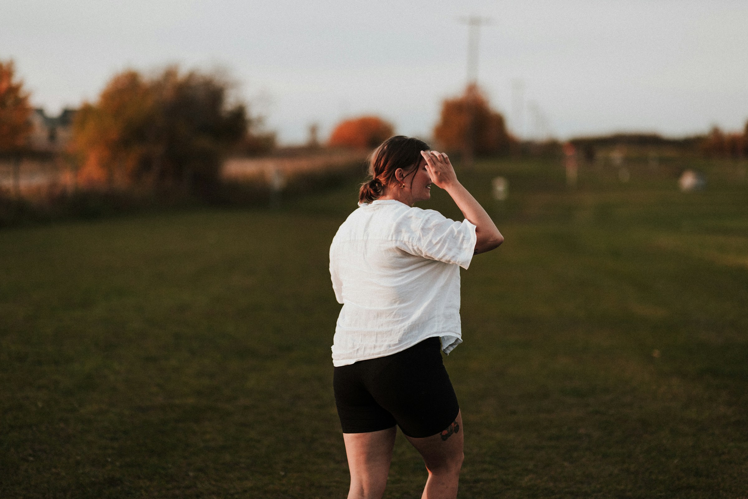Happy beginner walking outdoors on a weight loss journey