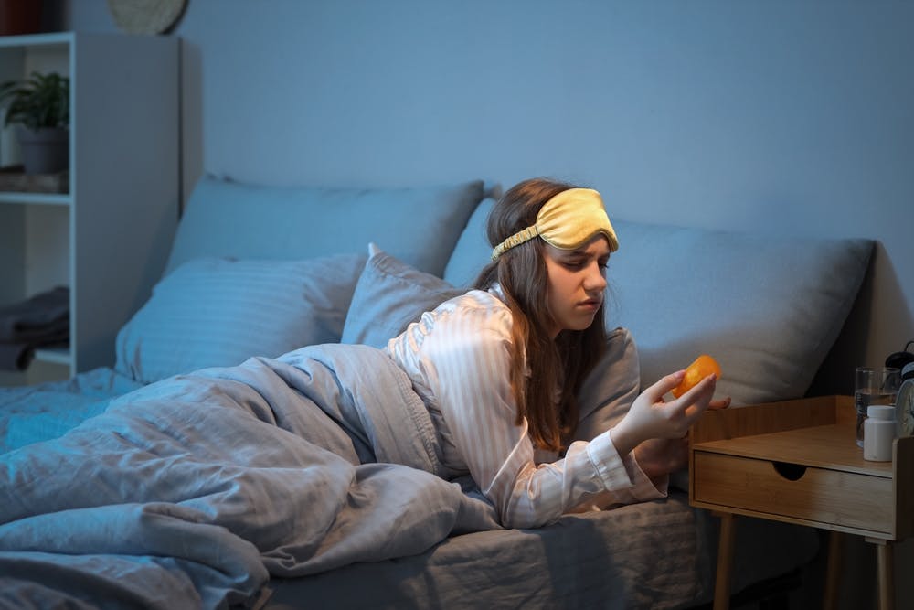 Person checking benadryl for sleep