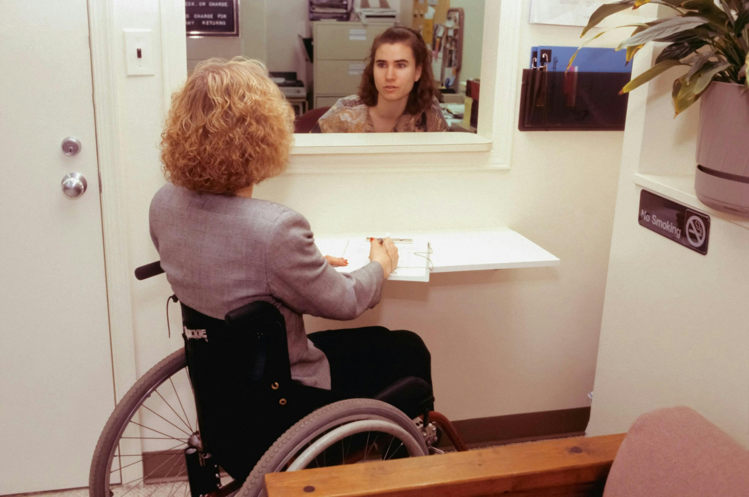 A lady experiencing one of the causes of high white blood cell count - autoimmune disease