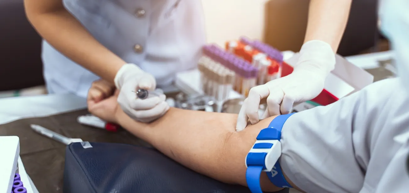 Nurse drawing blood sample to highlight basophil count