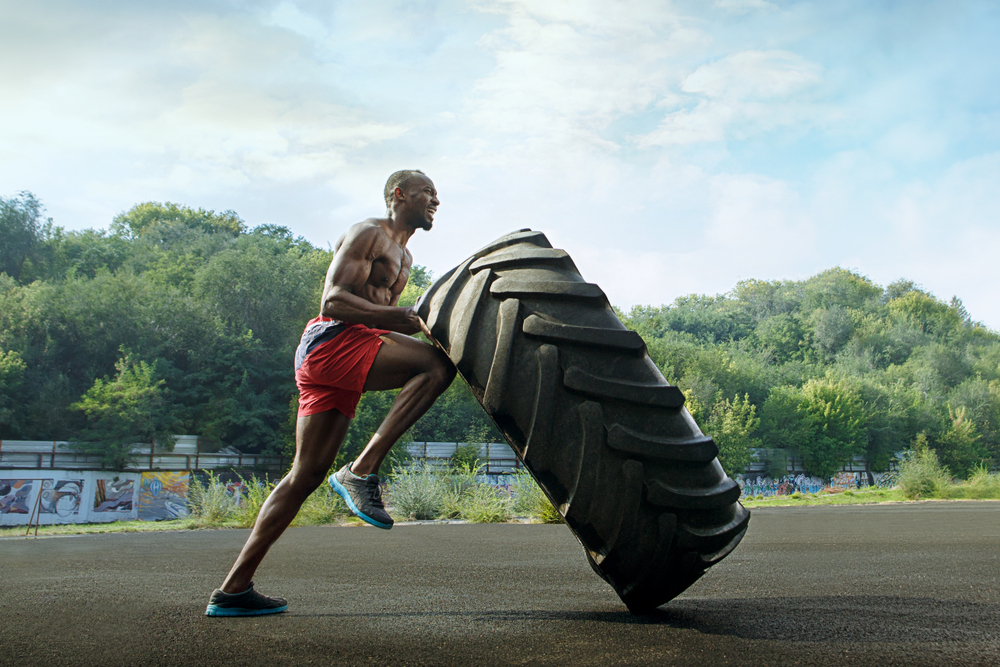 Athlete engaged in an intense workout leading to elevated AST levels