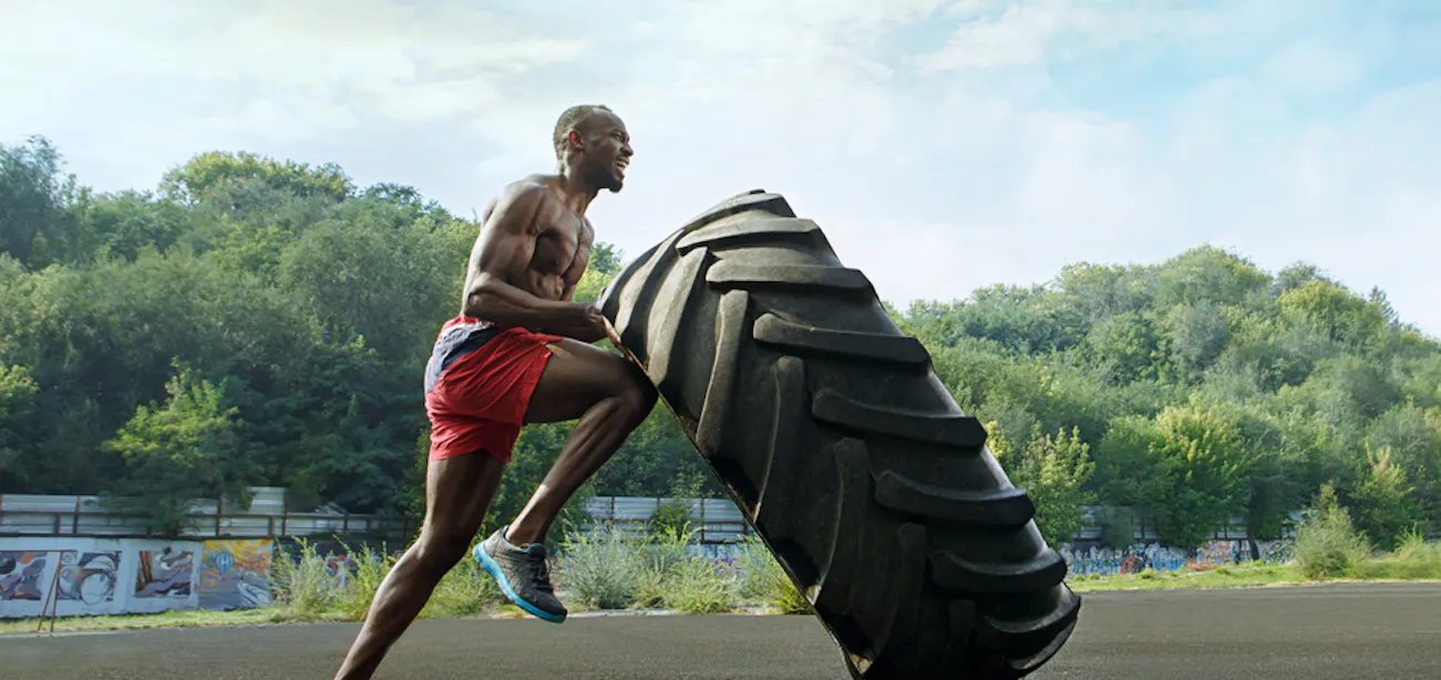 Athlete engaged in an intense workout leading to elevated AST levels