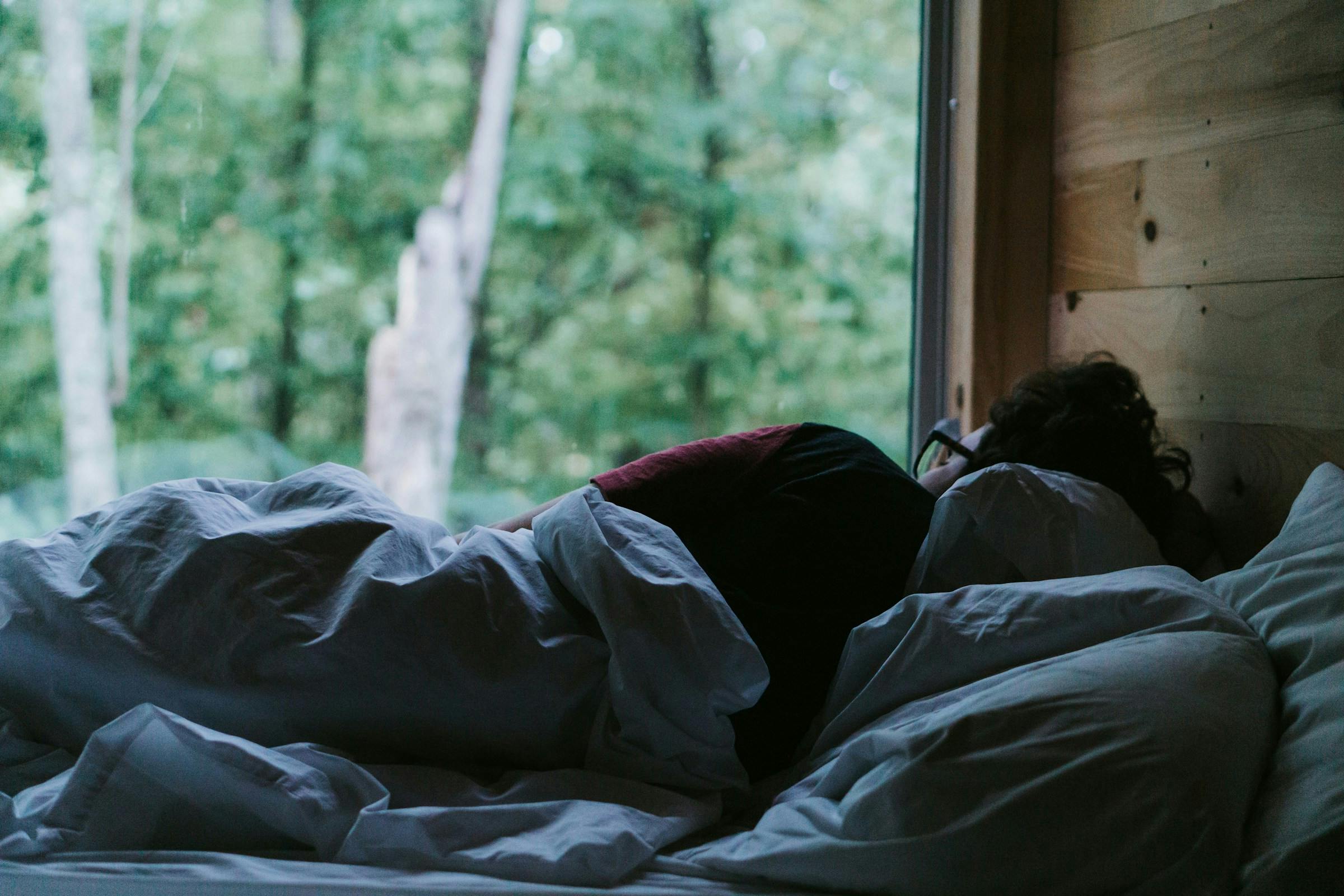 woman experiencing increased sleeping heart rate due to illness